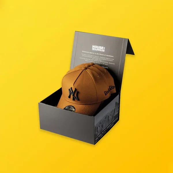 Baseball Cap Boxes — custom apparel boxes by Packmio A stack of baseball cap boxes in a custom size